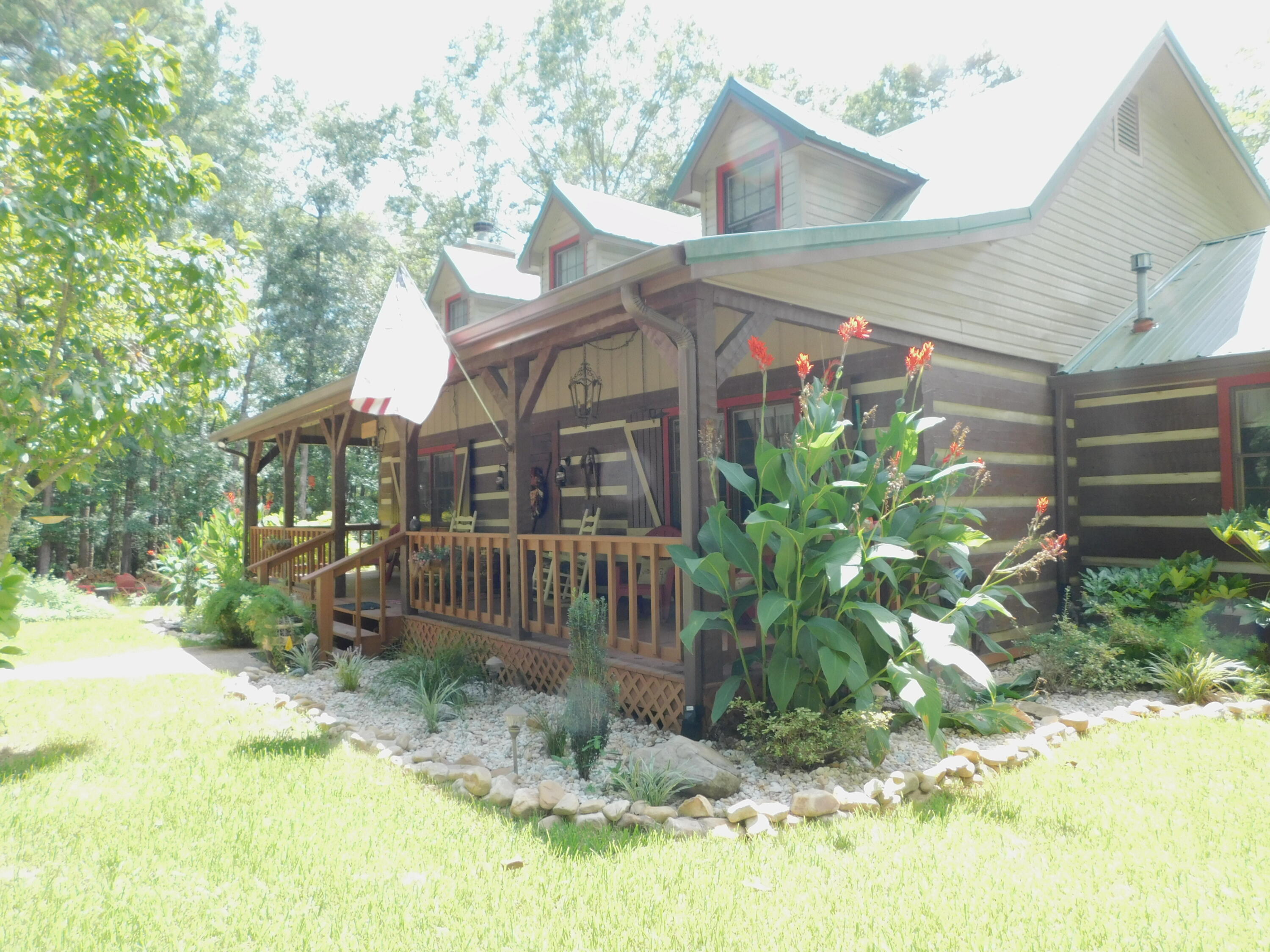 25278 Hidden Forest Lane Andalusia, AL 36421 - Photo 32 of 35 a front view of house with yard and trees in the background