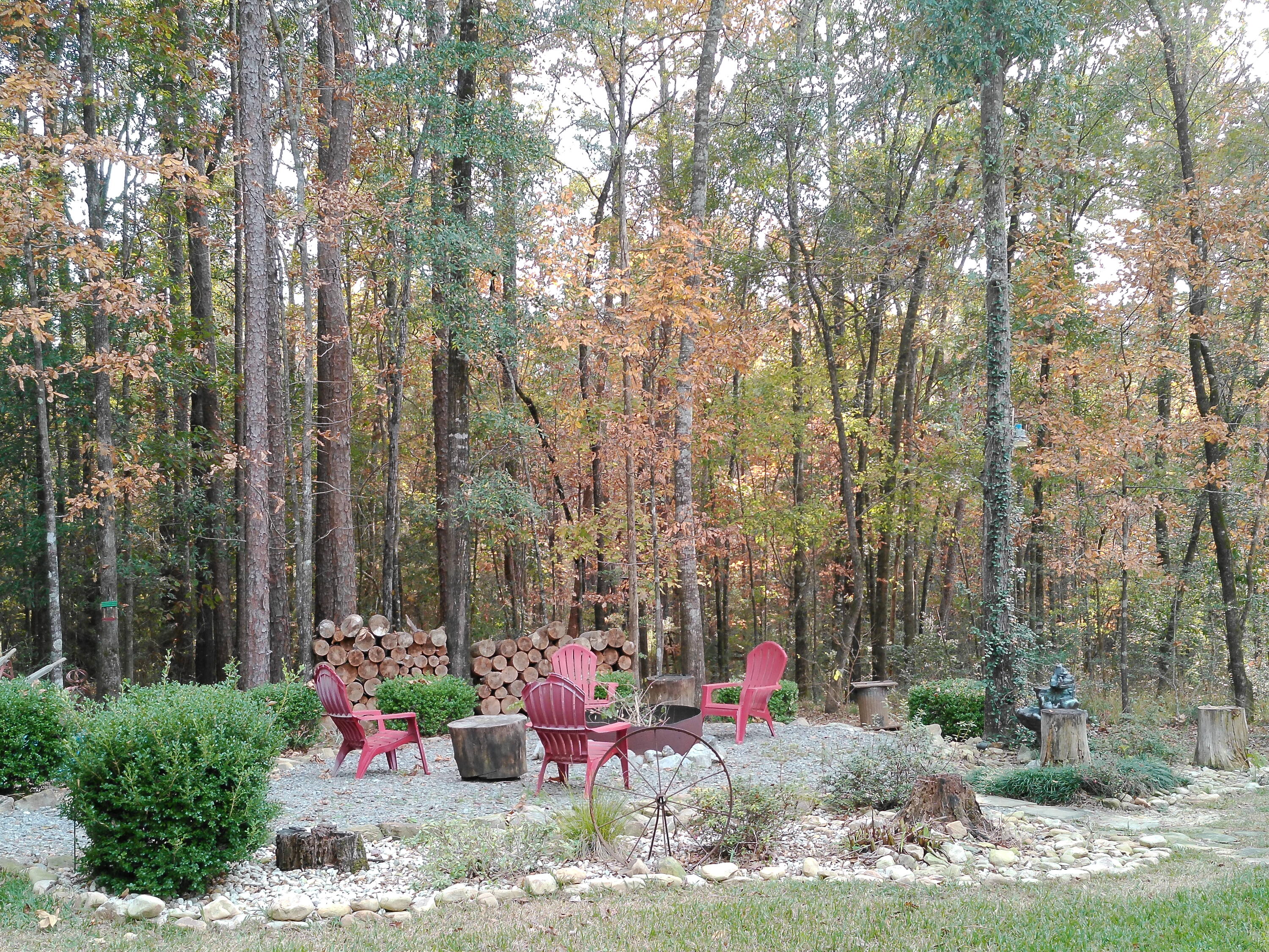 25278 Hidden Forest Lane Andalusia, AL 36421 - Photo 35 of 35 a backyard of a house with table and chairs