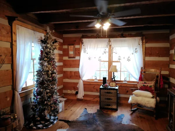 a room with furniture window and wooden floor