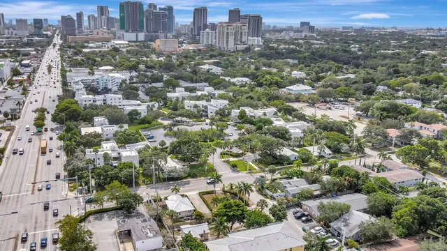 an aerial view of a city with lots of residential buildings