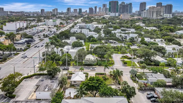 an aerial view of a city with lots of residential buildings
