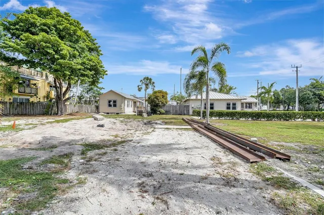 a view of back yard of a house