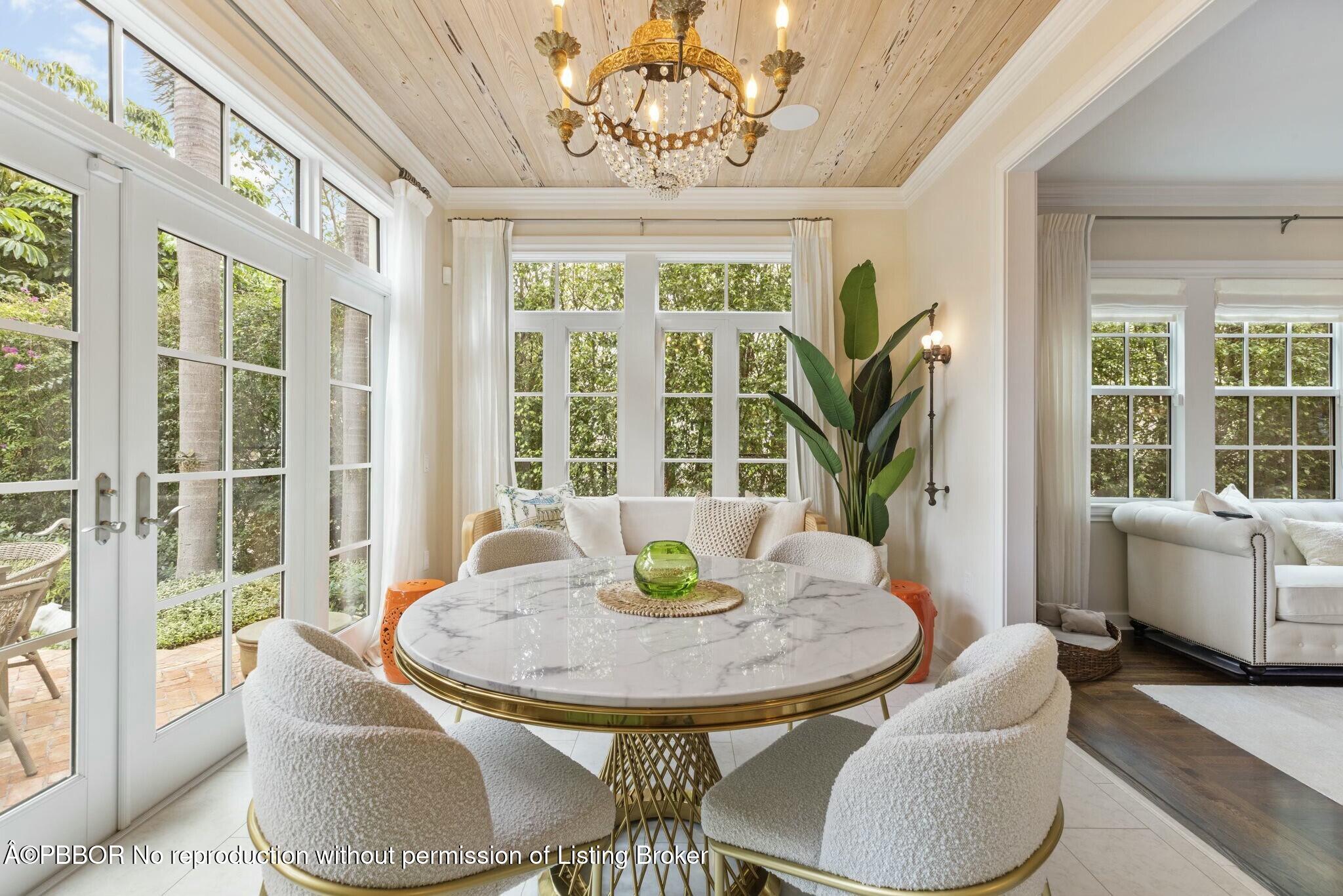 281 Cordova Road West Palm Beach, FL 33401 - Photo 12 of 25 a view of a dining room with furniture window and outside view