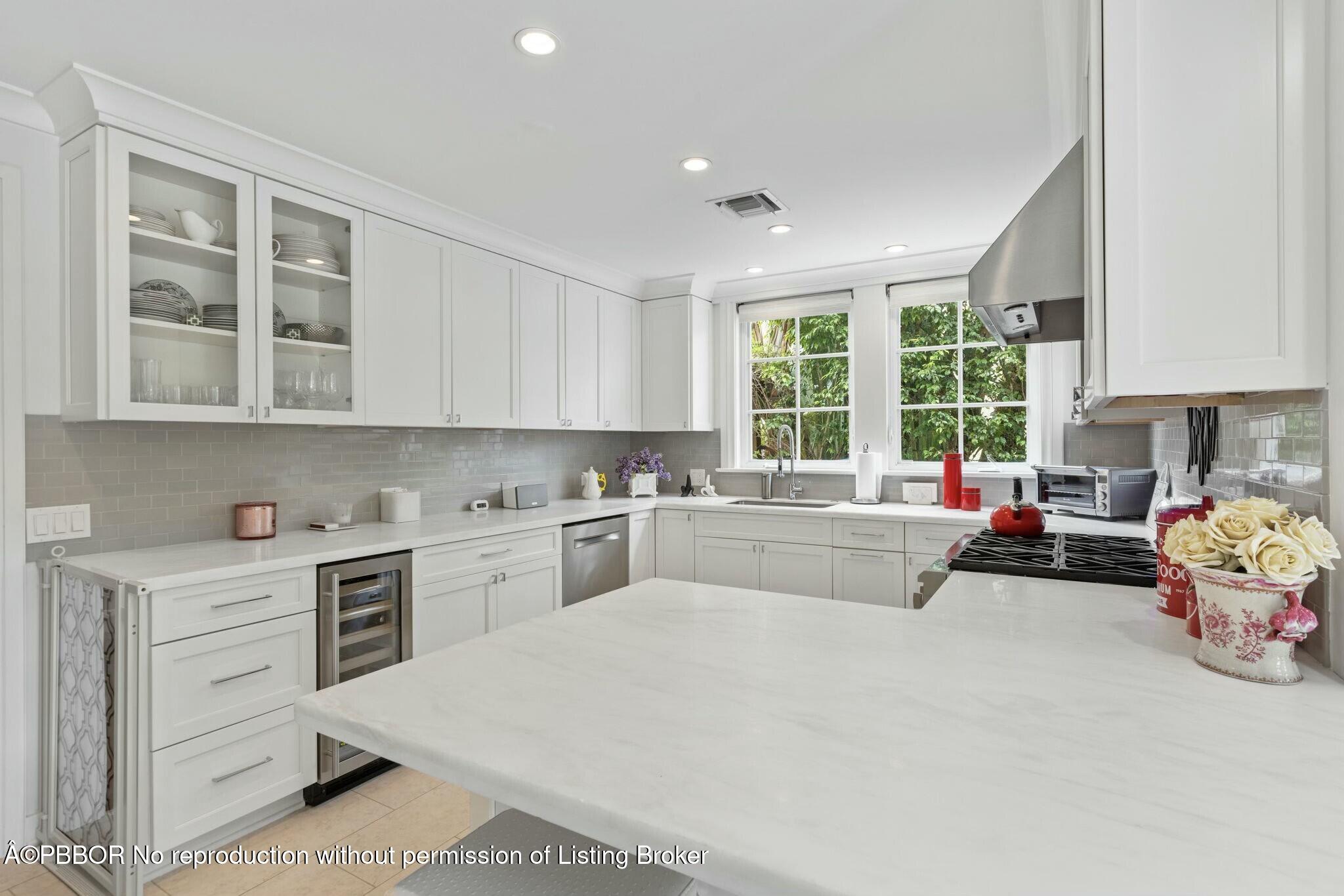 281 Cordova Road West Palm Beach, FL 33401 - Photo 15 of 25 a kitchen that has a sink and a stove in it