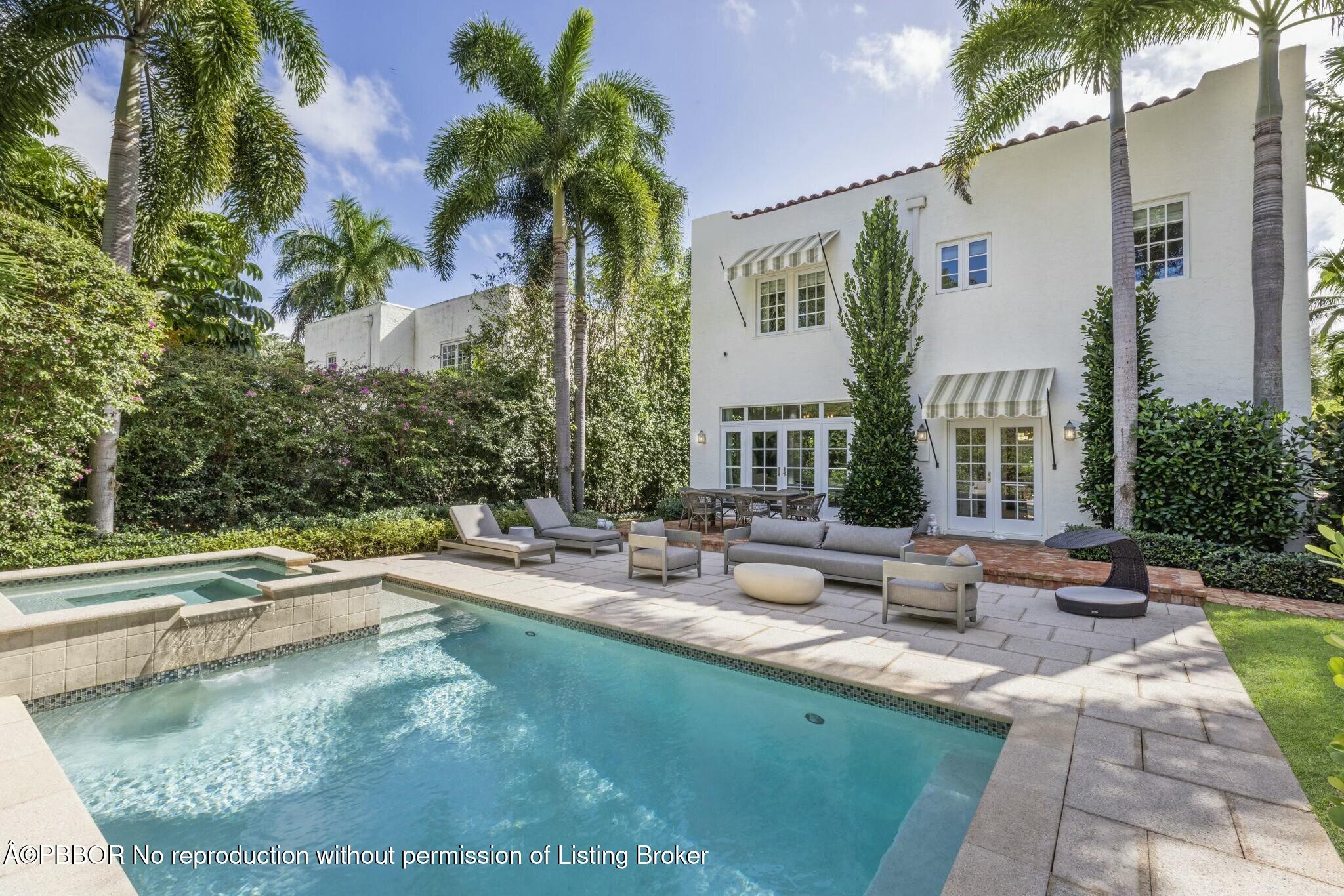 281 Cordova Road West Palm Beach, FL 33401 - Photo 2 of 25 a view of swimming pool with outdoor seating and house in the background