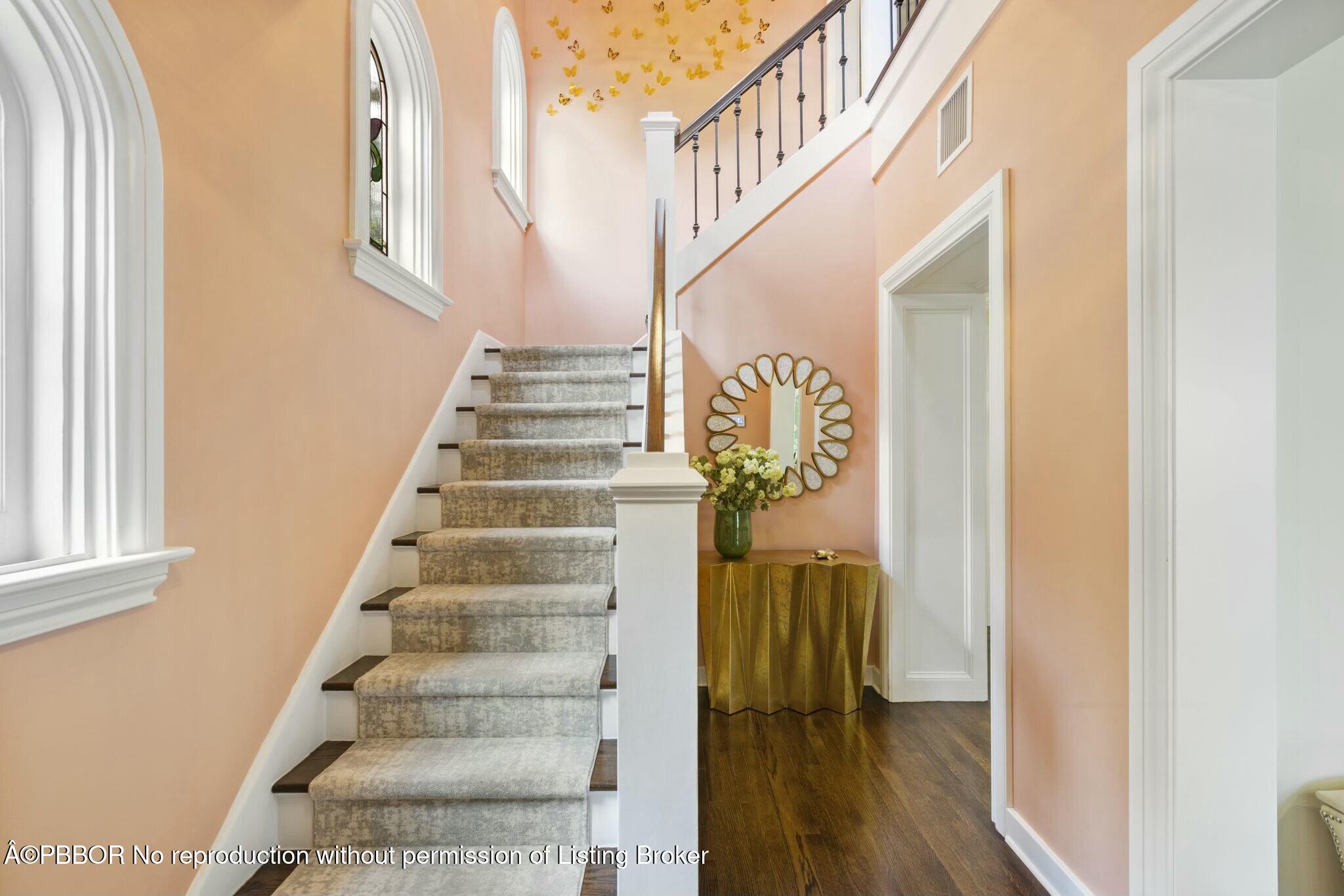 281 Cordova Road West Palm Beach, FL 33401 - Photo 21 of 25 a view of staircase with white walls and windows