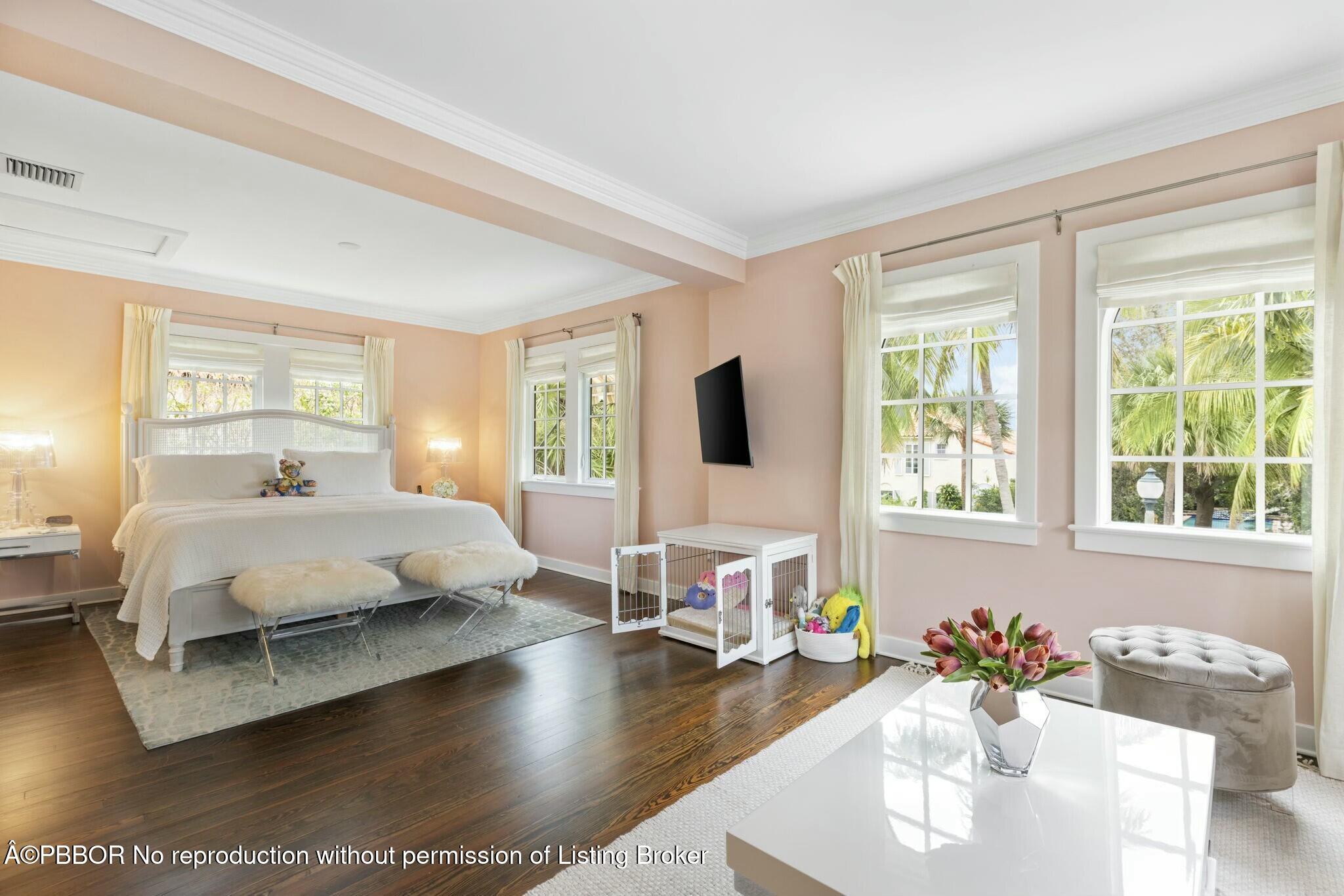 281 Cordova Road West Palm Beach, FL 33401 - Photo 24 of 25 a spacious bedroom with a bed and large windows