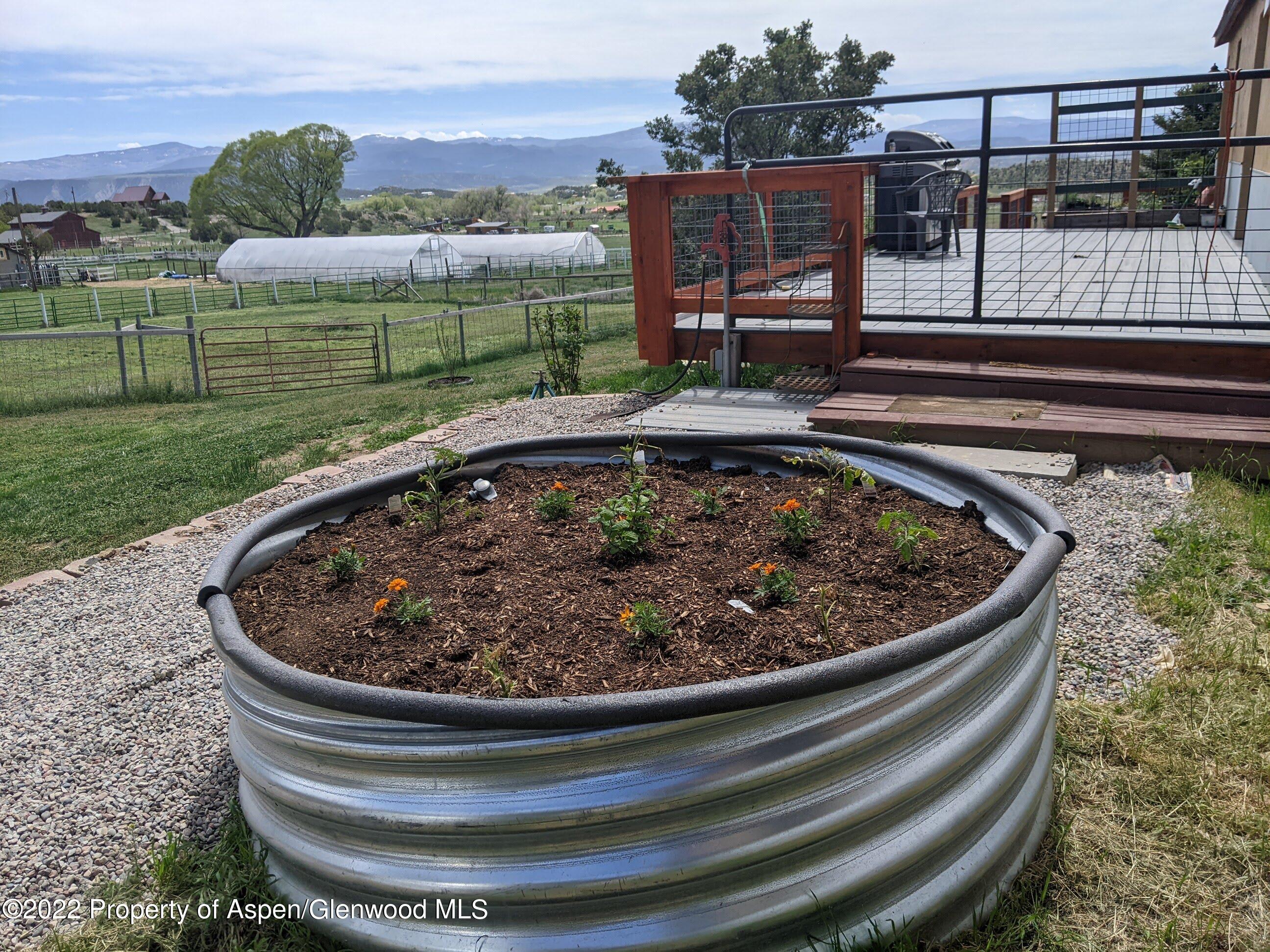 1407 County Road 237 Silt, CO 81652 - Photo 29 of 32 a view of a swimming pool with a yard
