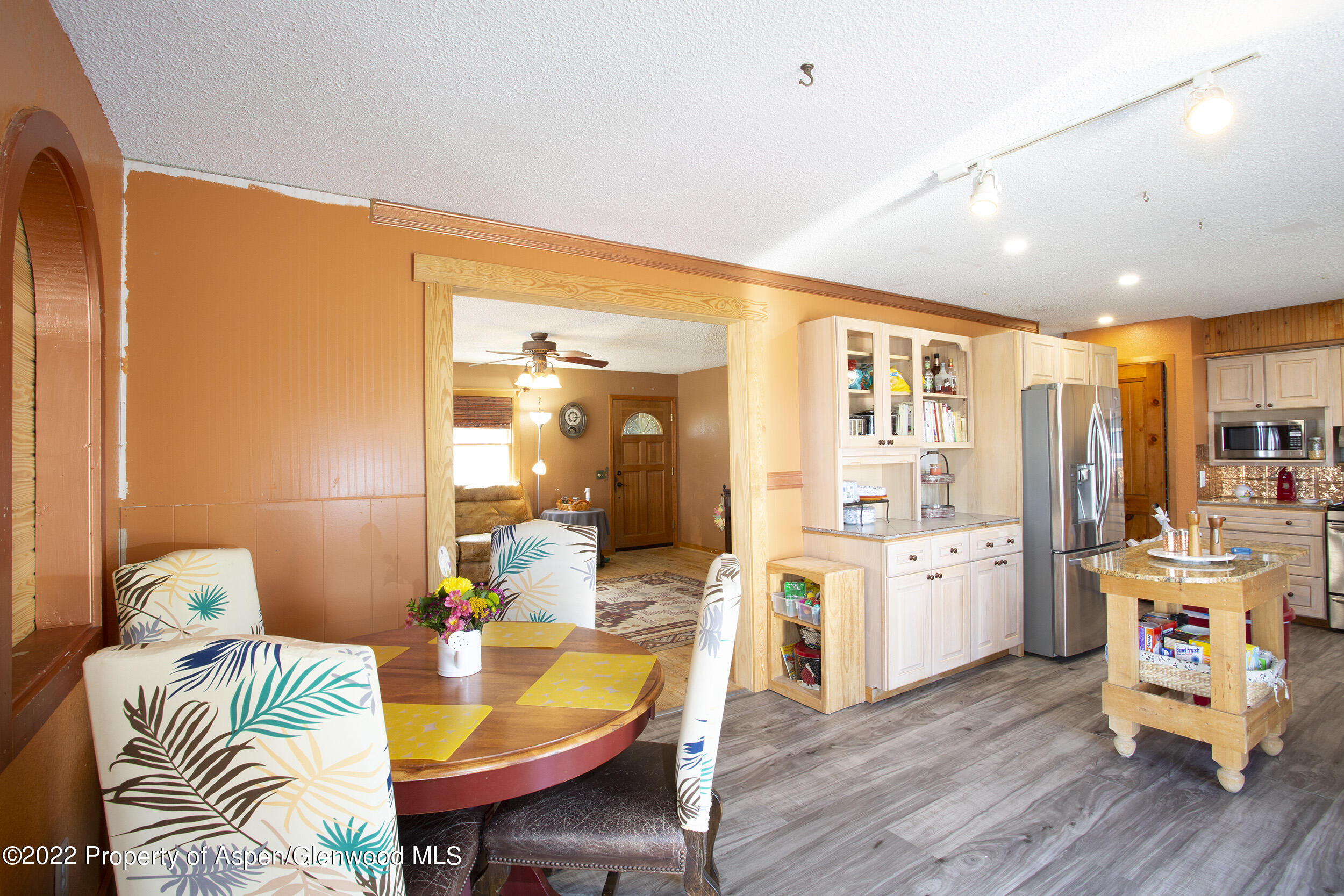 1407 County Road 237 Silt, CO 81652 - Photo 6 of 32 a large kitchen with a table and chairs