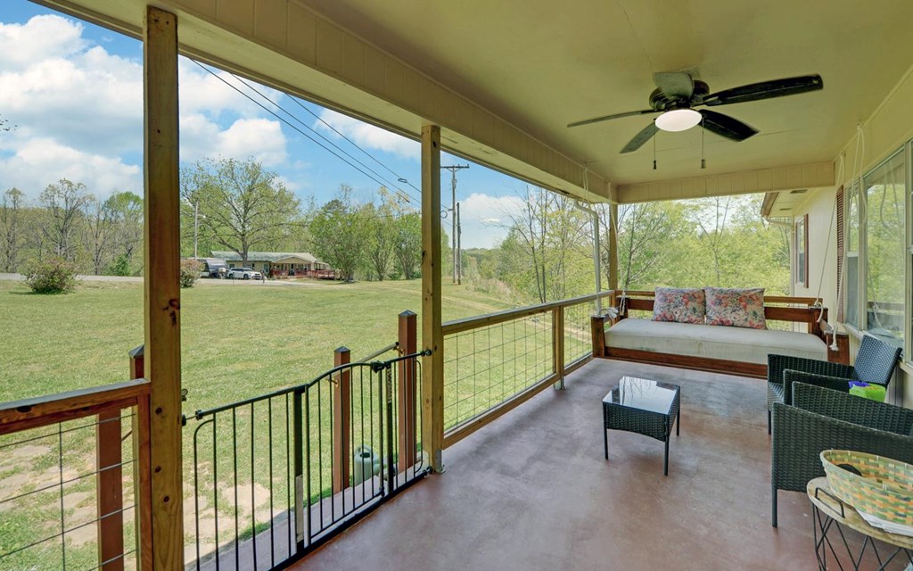 810 Grassy Creek Road Copperhill, TN 37317 - Photo 2 of 33 a view of a city from a balcony