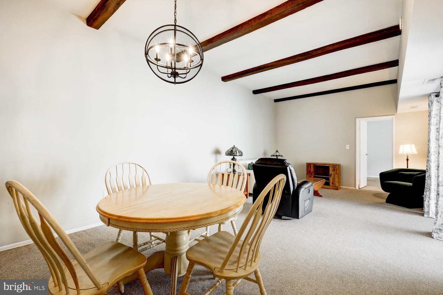 425 Valleybrook Drive Lancaster, PA 17601 - Photo 11 of 50 a view of a dining room with furniture and a chandelier