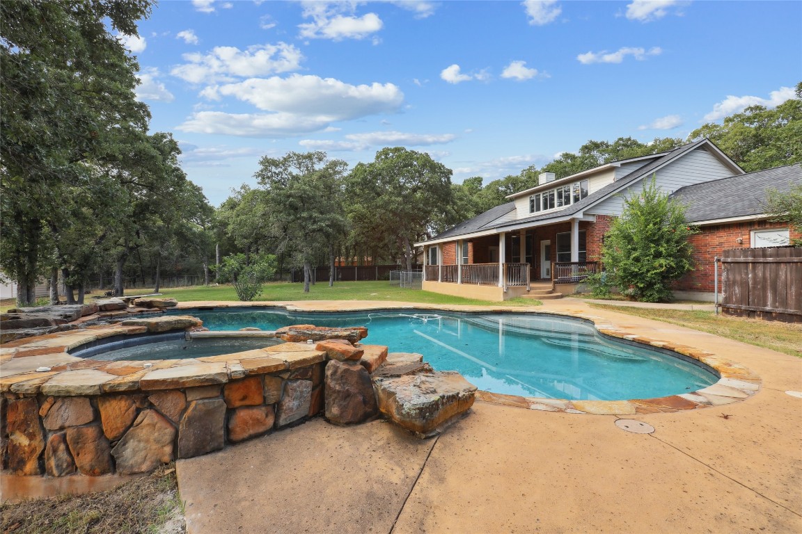 120 Juniper Trail Elgin, TX 78621 - Photo 27 of 32 View of pool featuring a patio and a pool with connected hot tub
