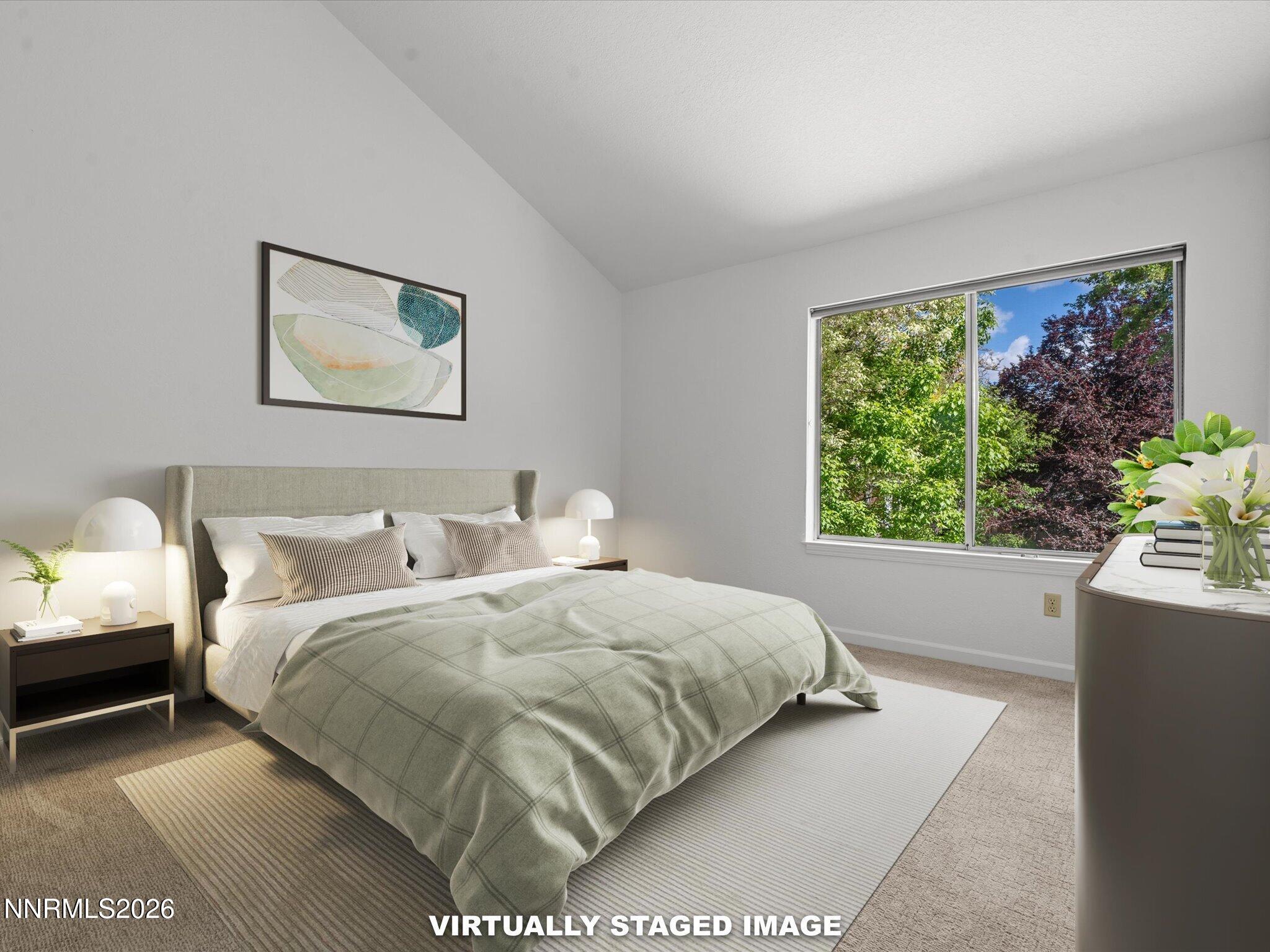 3170 Oakshire Court Reno, NV 89509 - Photo 24 of 43 a bedroom with a bed and a painting on the wall