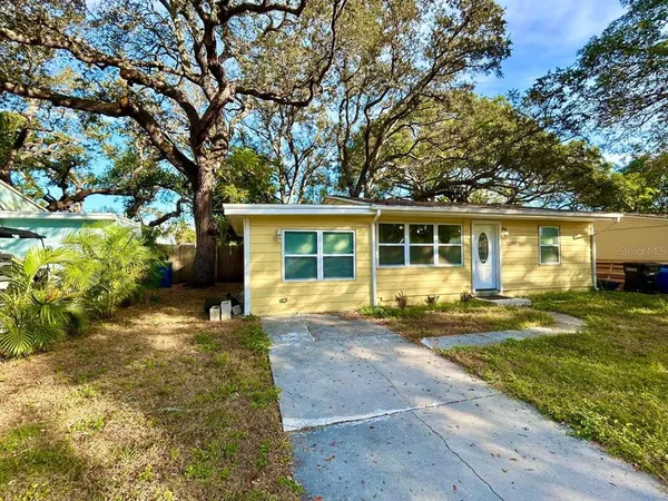 front view of a house with a yard