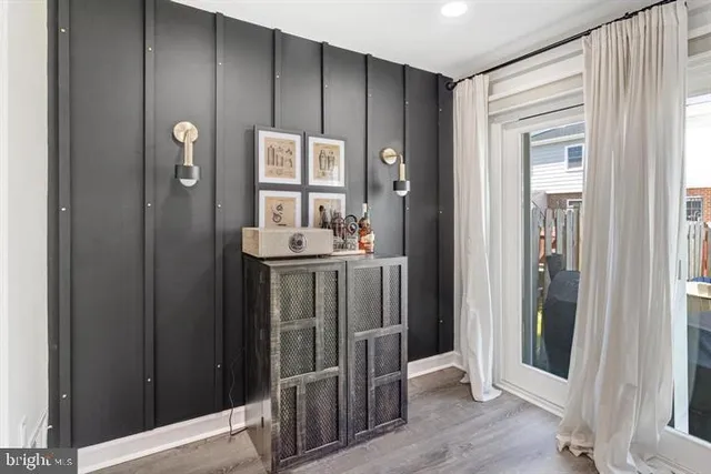 a bathroom with a mirror and a shower