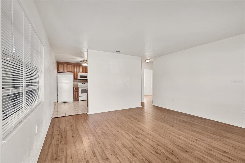 1622 29th Street Sarasota, FL 34234 - Photo 13 of 39 wooden floor in an empty room