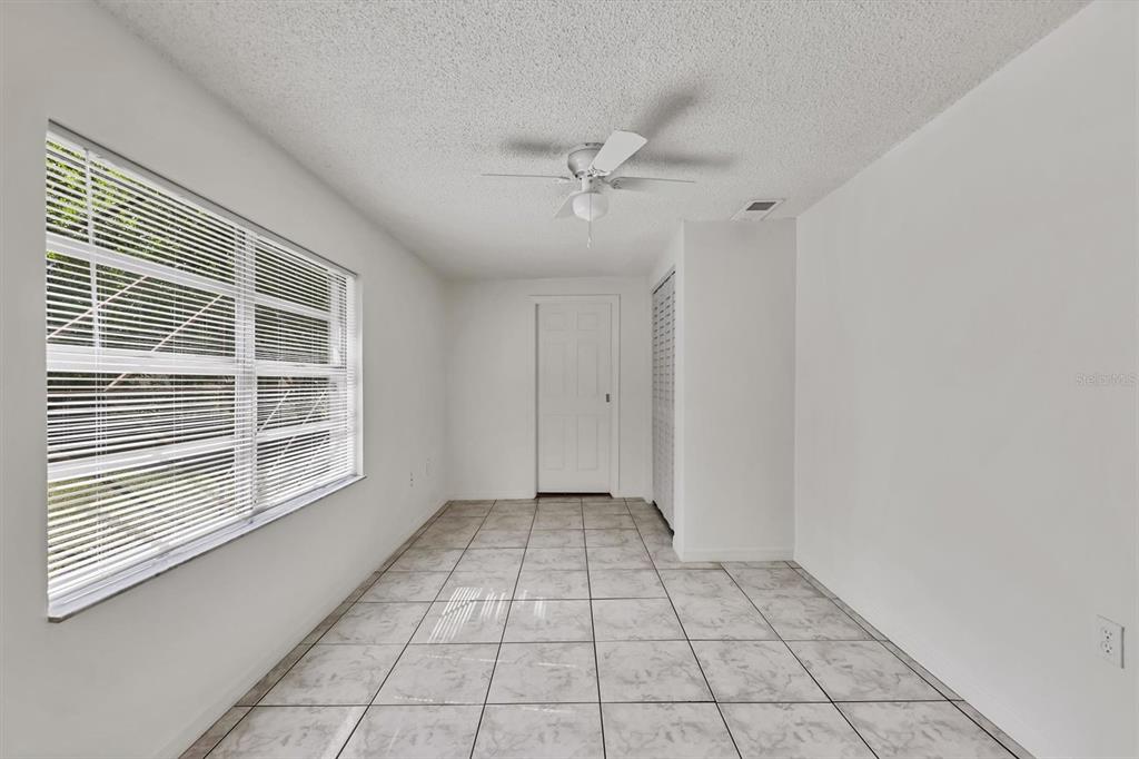 1622 29th Street Sarasota, FL 34234 - Photo 17 of 39 a view of an empty room with a window