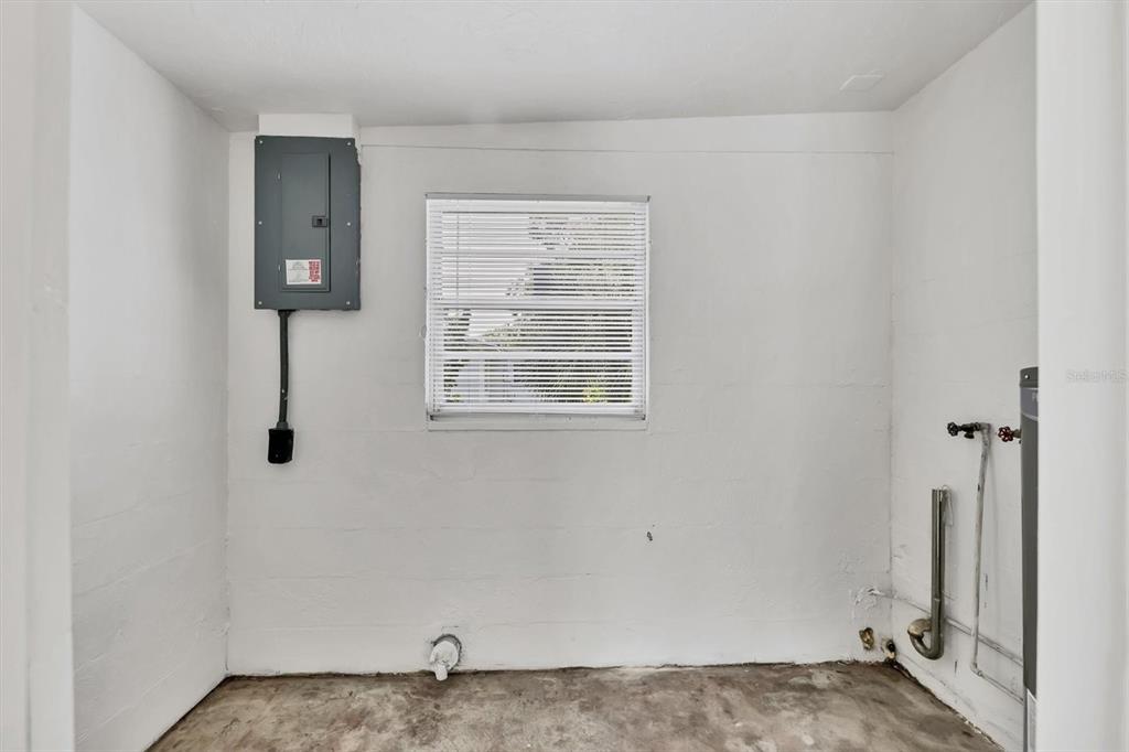 1622 29th Street Sarasota, FL 34234 - Photo 24 of 39 a view of an empty room with windows