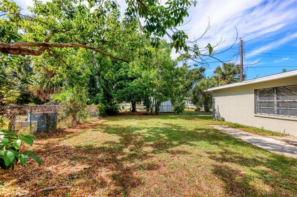 1622 29th Street Sarasota, FL 34234 - Photo 28 of 39 a view of a house with a yard