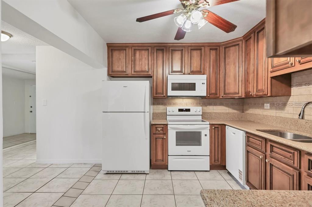 1622 29th Street Sarasota, FL 34234 - Photo 7 of 39 a kitchen with cabinets stainless steel appliances and a counter space