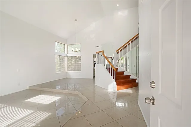 a view of entryway and hall with a window