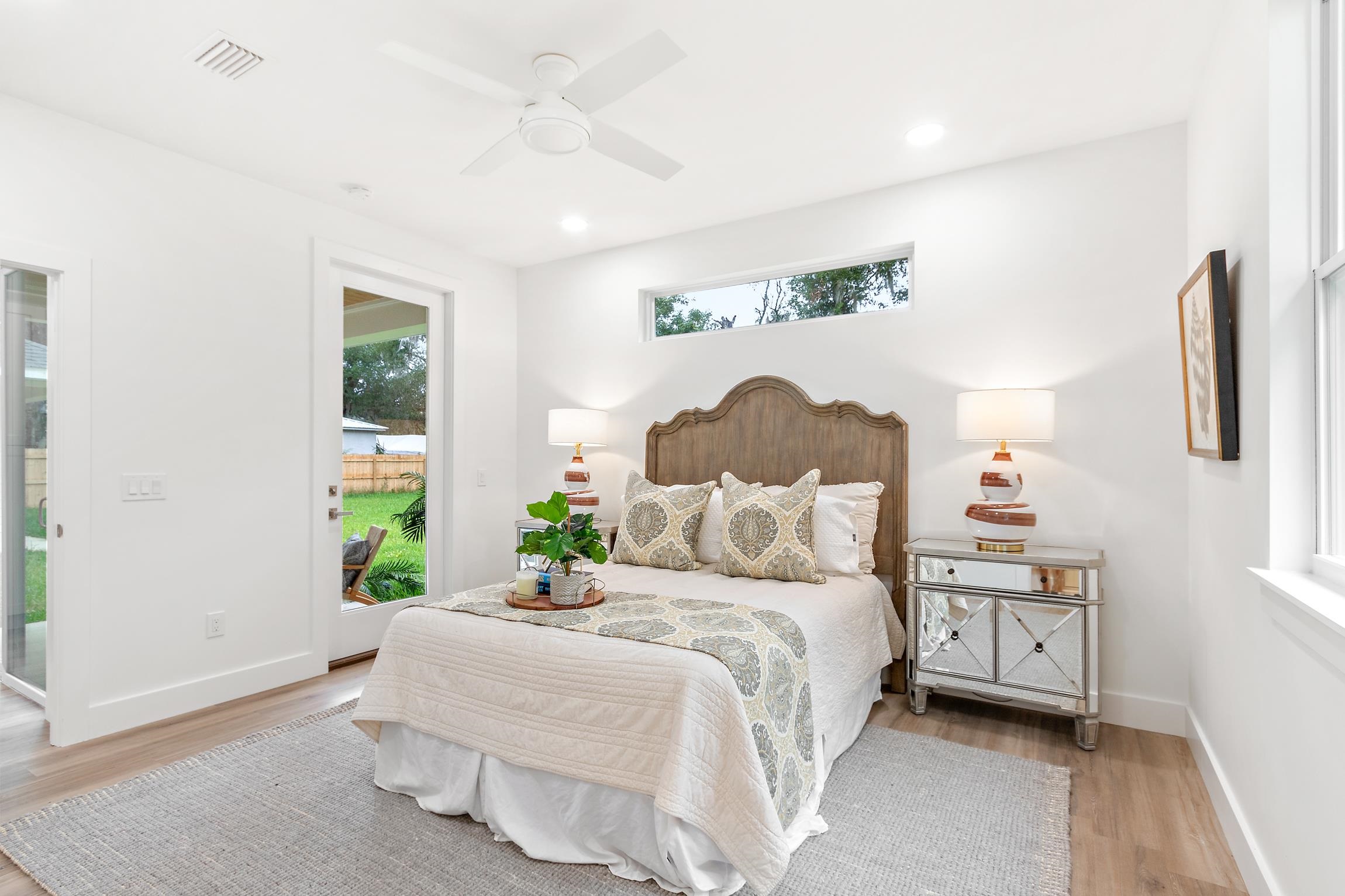 24 River Road St. Augustine, FL 32084 - Photo 14 of 26 a bedroom with a bed and a window