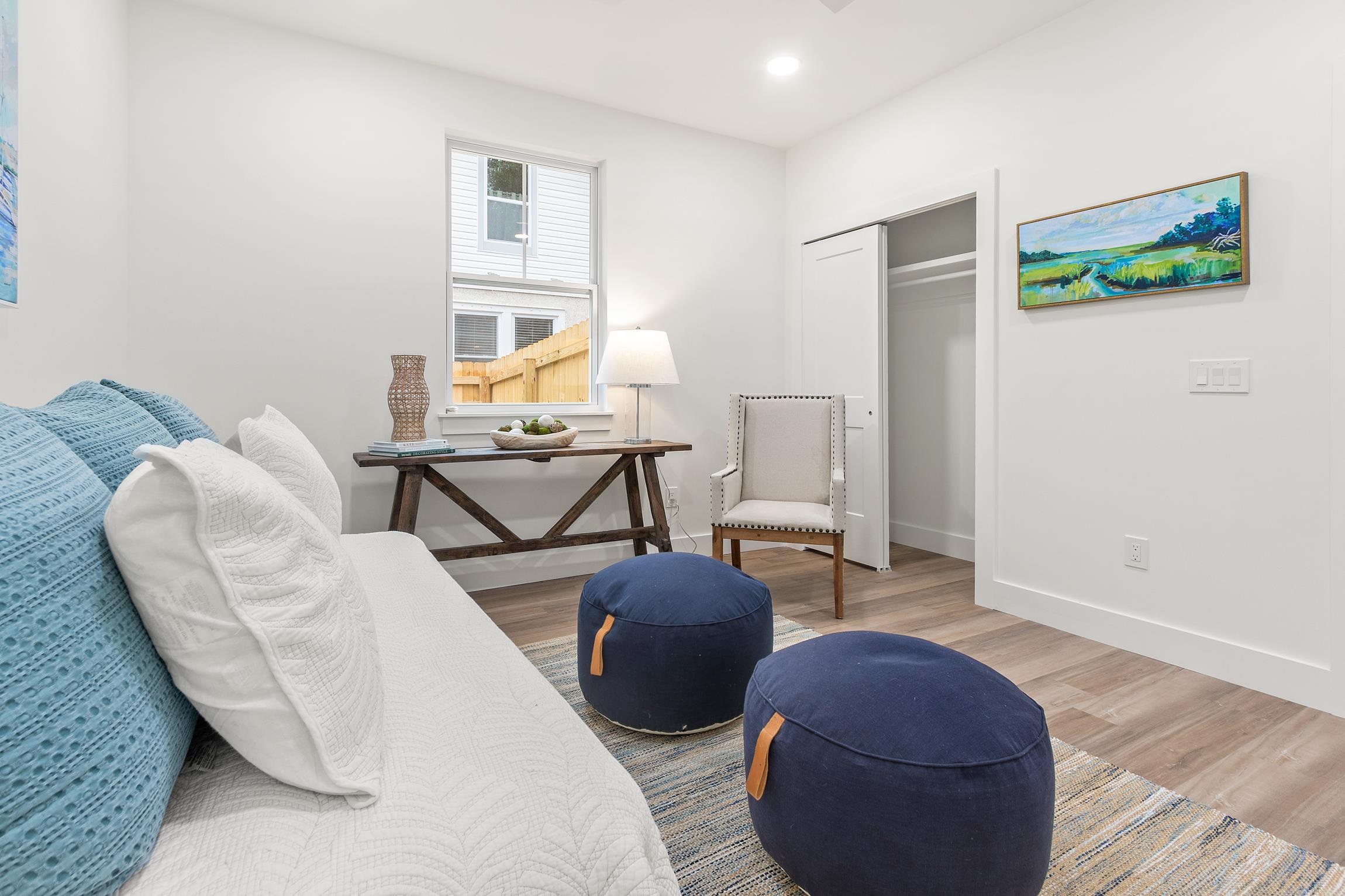 24 River Road St. Augustine, FL 32084 - Photo 21 of 26 a living room with furniture and a wooden floor