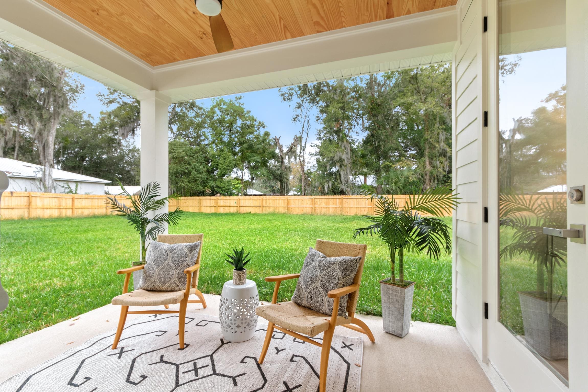 24 River Road St. Augustine, FL 32084 - Photo 22 of 26 a view of yard with seating area and green space