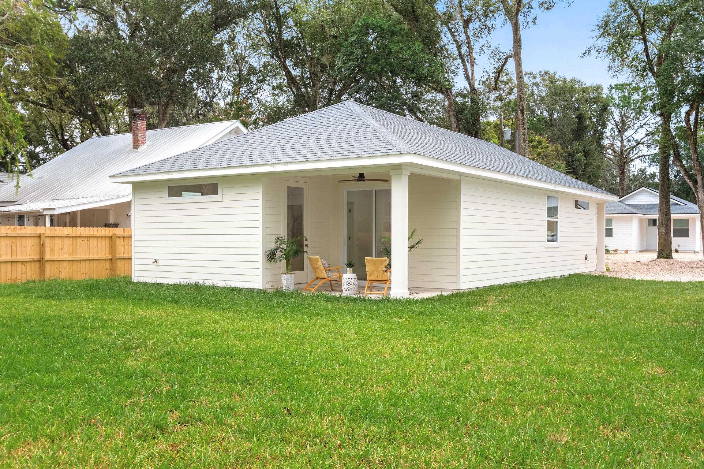 24 River Road St. Augustine, FL 32084 - Photo 24 of 26 a view of a house with a yard