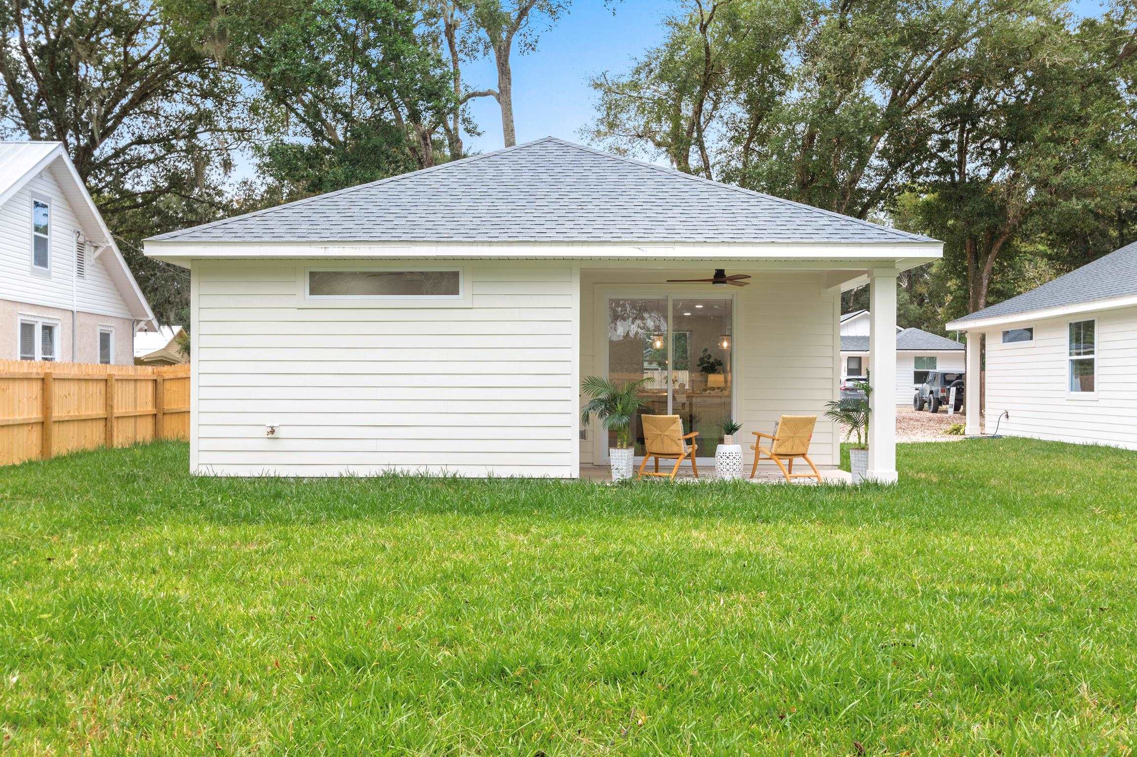 24 River Road St. Augustine, FL 32084 - Photo 25 of 26 a view of a house with a yard and sitting area