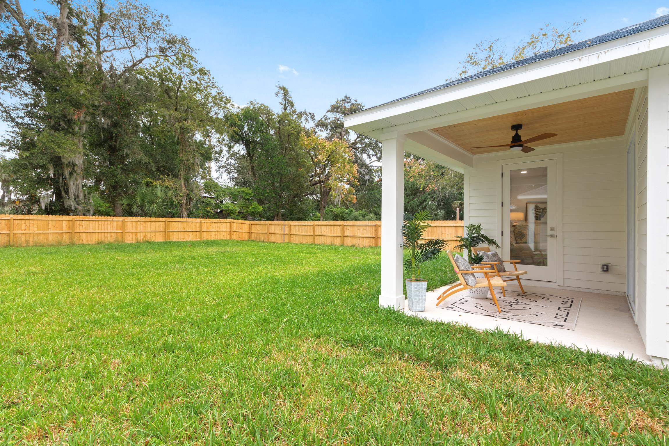 24 River Road St. Augustine, FL 32084 - Photo 26 of 26 a view of a backyard with sitting area