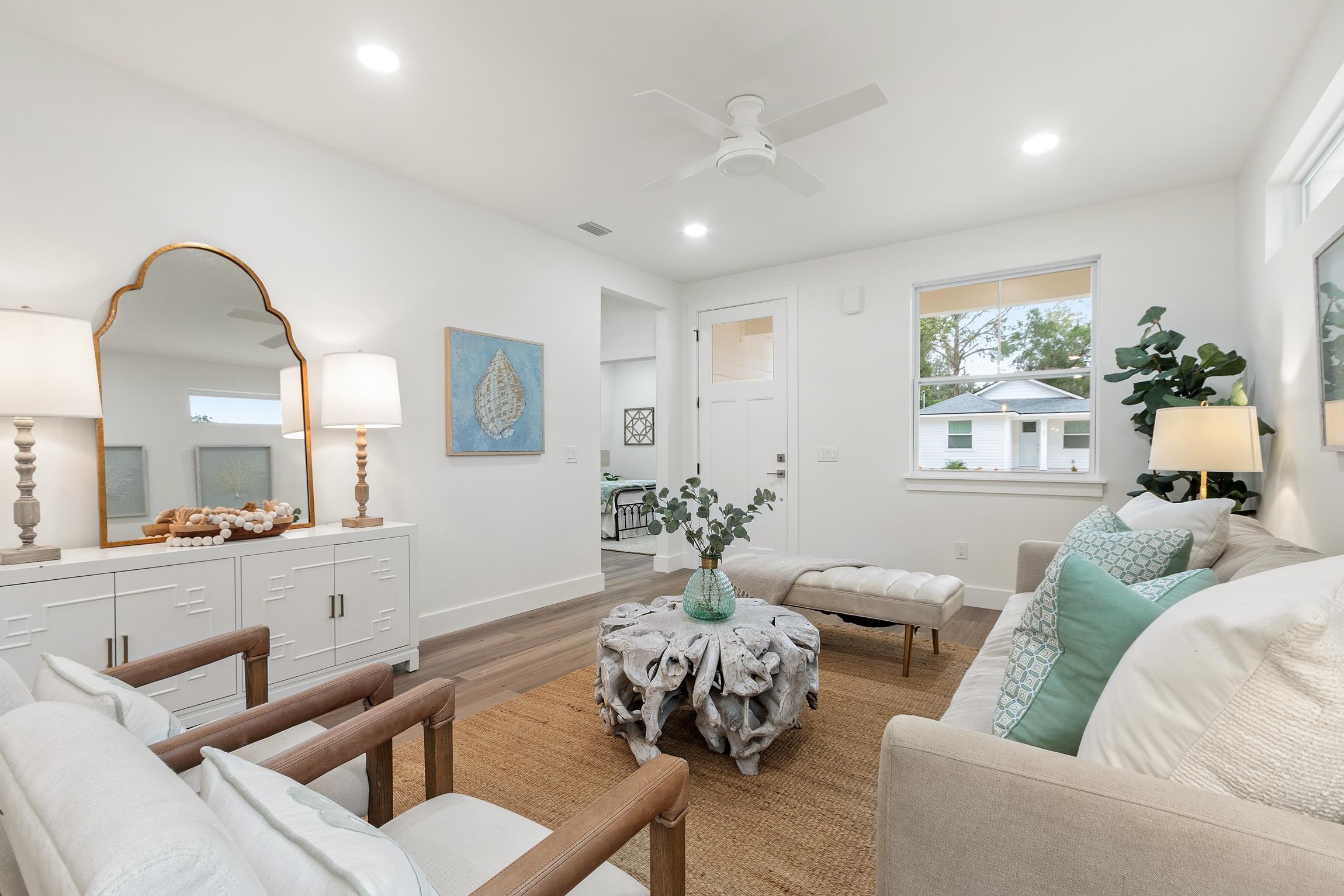 24 River Road St. Augustine, FL 32084 - Photo 7 of 26 a living room with furniture and a large window