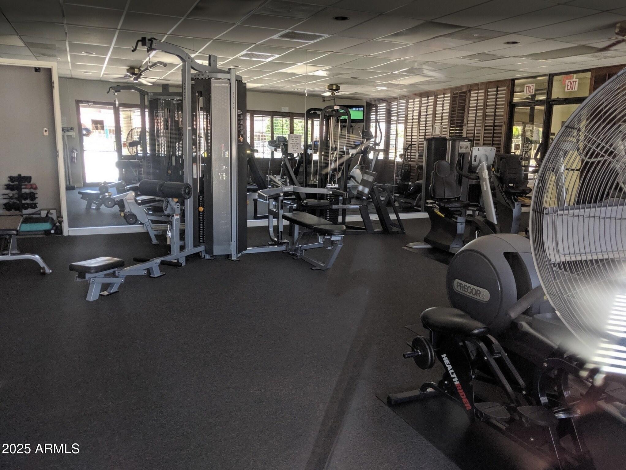 111 South Greenfield Road, Unit 724 Mesa, AZ 85206 - Photo 21 of 23 a view of a room with gym equipment