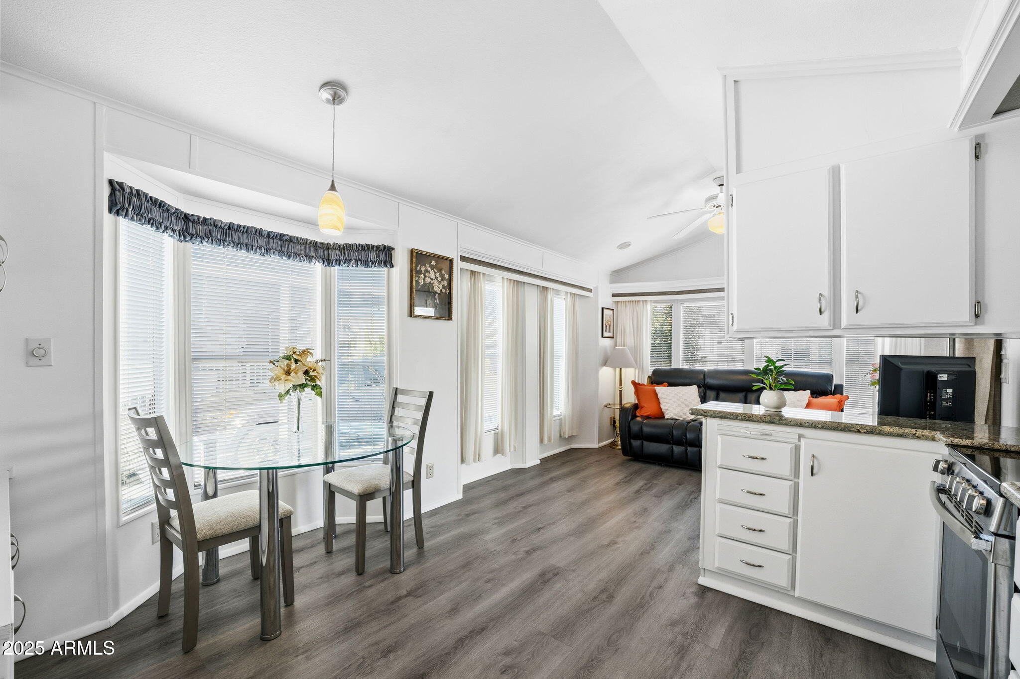 111 South Greenfield Road, Unit 724 Mesa, AZ 85206 - Photo 6 of 23 a view of a kitchen and dining room