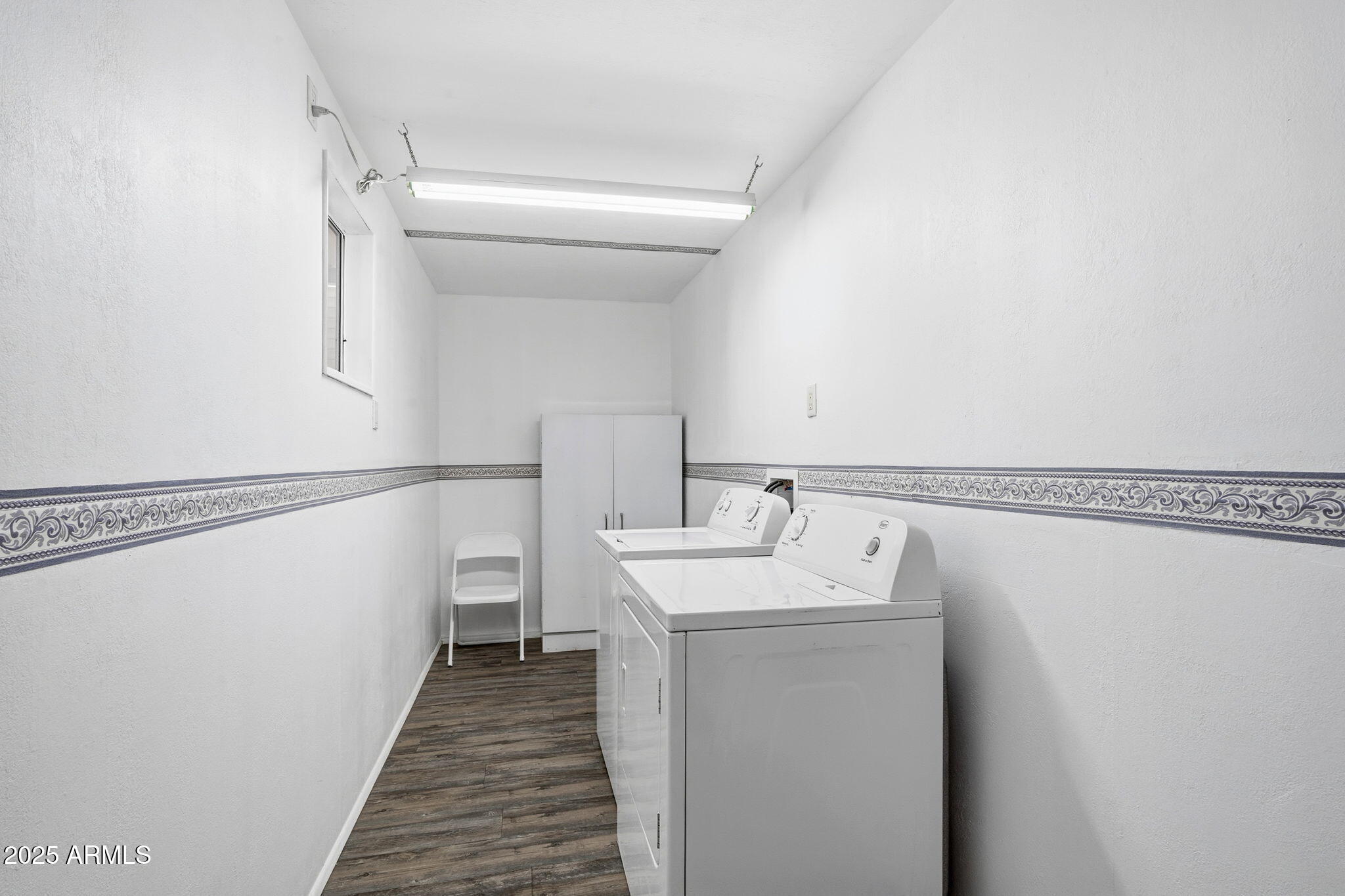 111 South Greenfield Road, Unit 724 Mesa, AZ 85206 - Photo 9 of 23 a utility room with dryer and washer