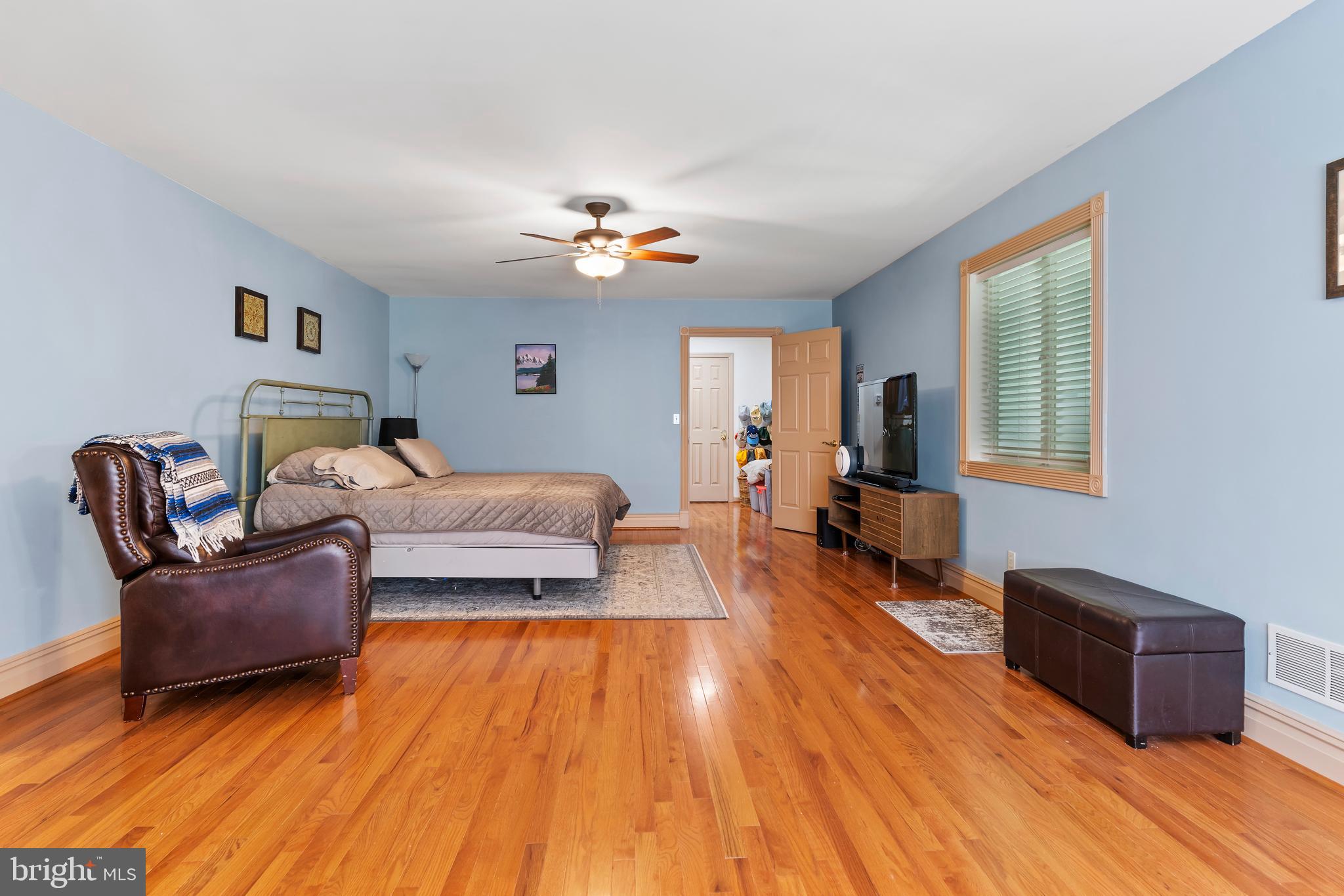 176 Richland Road Carlisle, PA 17015 - Photo 29 of 59 a living room with furniture and a wooden floor