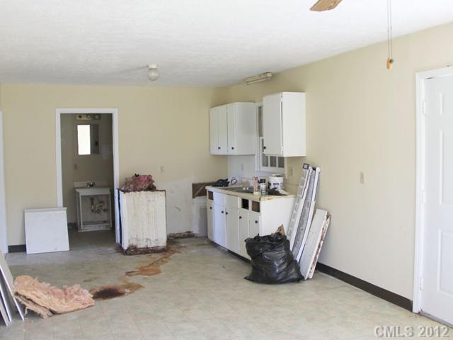 1-2 Cason Oldfield Road Morven, NC 28119 - Photo 11 of 12 a view of kitchen with refrigerator and window