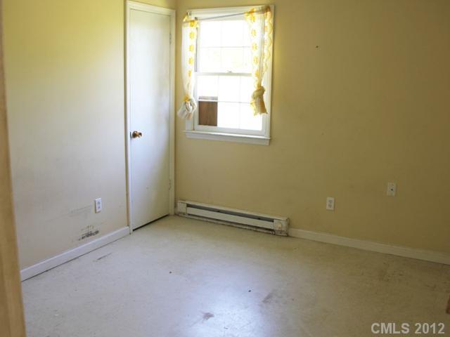 1-2 Cason Oldfield Road Morven, NC 28119 - Photo 5 of 12 an empty room with a window