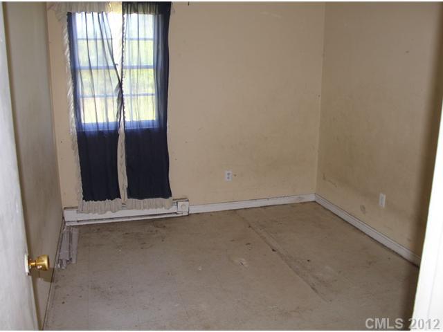1-2 Cason Oldfield Road Morven, NC 28119 - Photo 6 of 12 an empty room with window