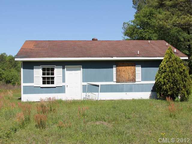 1-2 Cason Oldfield Road Morven, NC 28119 - Photo 7 of 12 a view of house with a yard