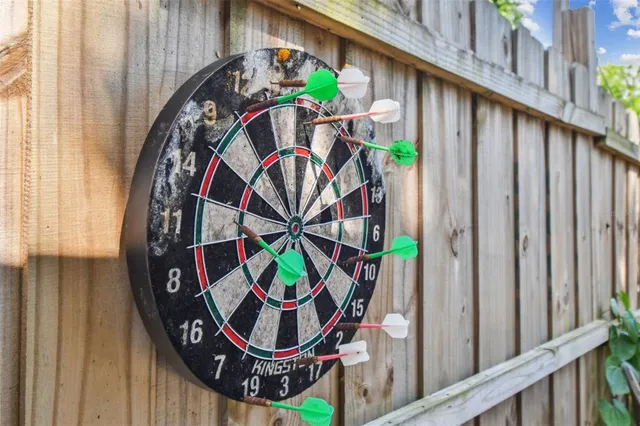 a view of a swimming pool with a yard