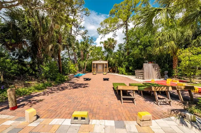 a room with pool table and glass door