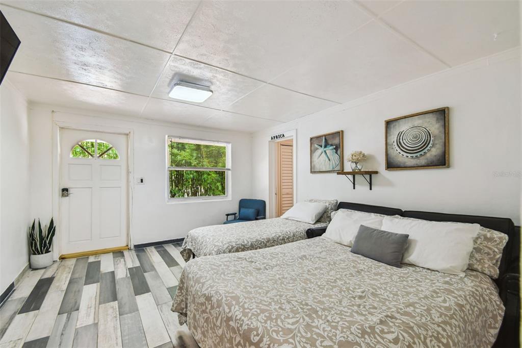 5909 Mohr Road Tampa, FL 33615 - Photo 35 of 48 a bedroom with a bed and a window
