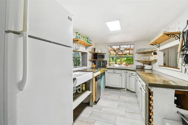 a bathroom with a bathtub and sink
