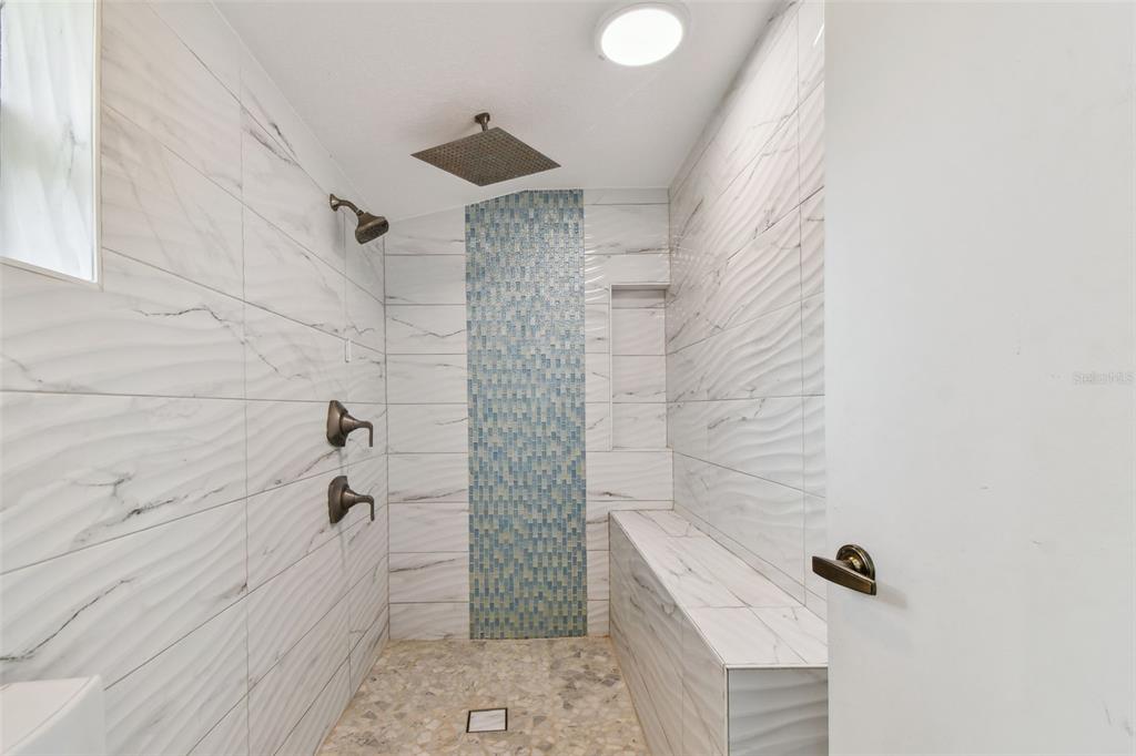 5909 Mohr Road Tampa, FL 33615 - Photo 43 of 48 a bathroom with a shower