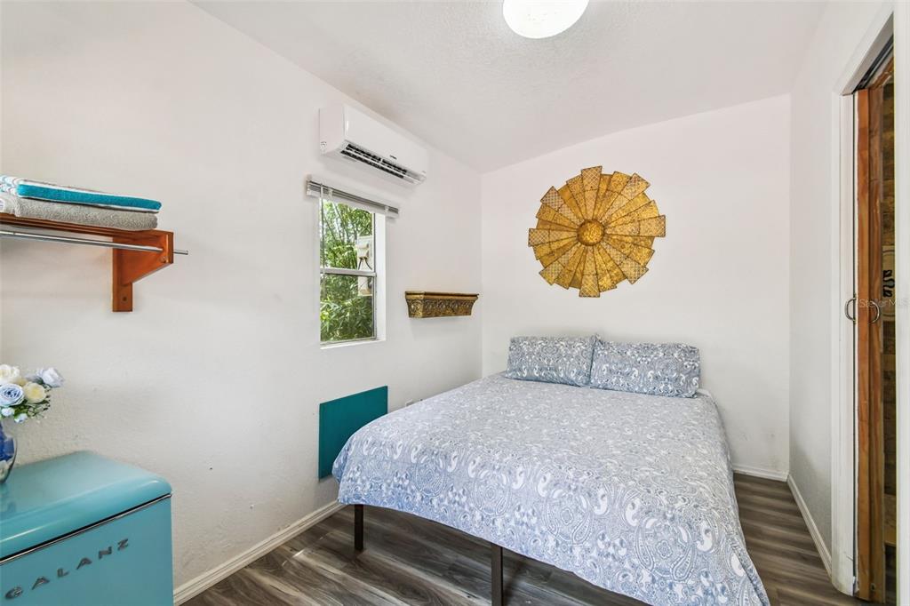5909 Mohr Road Tampa, FL 33615 - Photo 45 of 48 a bedroom with a bed and a window