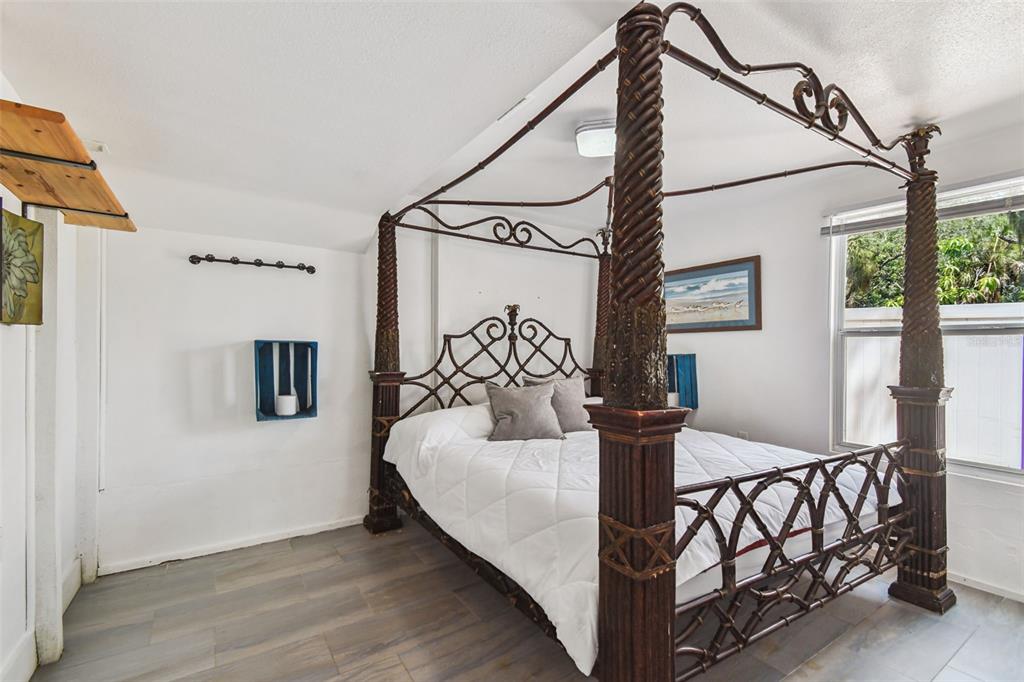 5909 Mohr Road Tampa, FL 33615 - Photo 47 of 48 a bedroom with bed and window