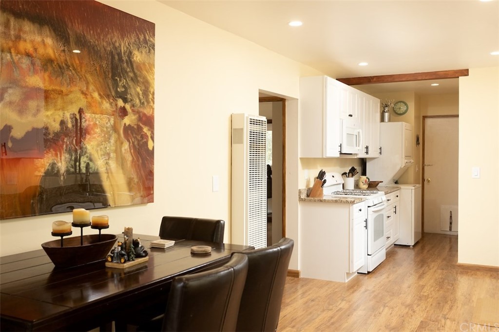 1270 Sheephorn Road Big Bear Lake, CA 92315 - Photo 6 of 25 a kitchen with stainless steel appliances granite countertop a sink stove and refrigerator