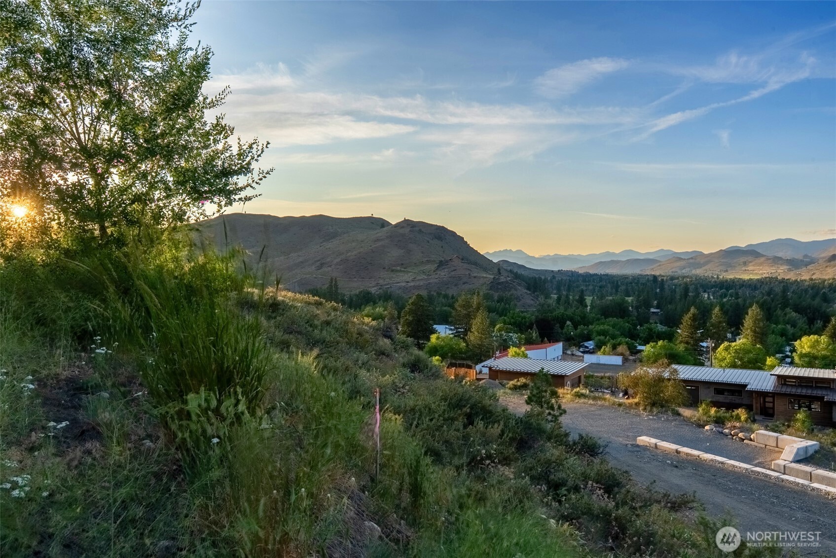 0 Isabella Lane Twisp, WA 98856 - Photo 21 of 36 a view of a town with mountains in the background