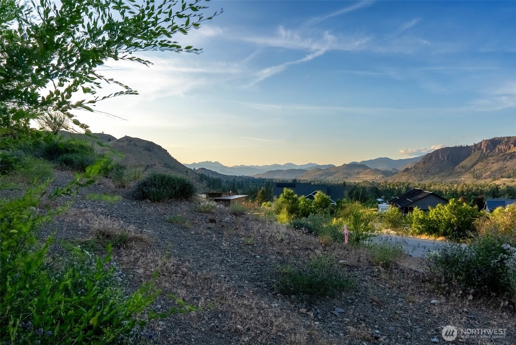 0 Isabella Lane Twisp, WA 98856 - Photo 3 of 36 a view of a lake with mountains in the background